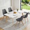 Chaises scandinaves en similicuir et pieds en hêtre